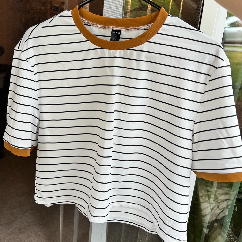 Black and white striped cropped t-shirt with golden/mustard yellow, size large.